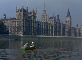 Movie still from “Million Dollar Mermaid” (1952), directed by Mervyn LeRoy – Two people in a boat in the middle of a river; Extreme Wide shot, High angle