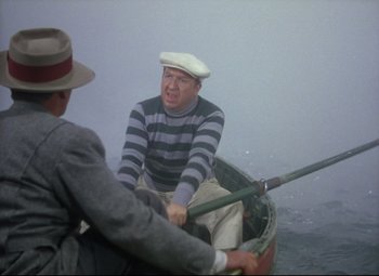 Movie still from “Million Dollar Mermaid” (1952), directed by Mervyn LeRoy – Two men are in a small boat in the water; Medium shot, Over the shoulder angle