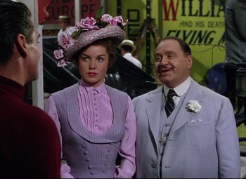 Movie still from “Million Dollar Mermaid” (1952), directed by Mervyn LeRoy – A man and a woman standing next to each other; Medium shot, Over the shoulder angle