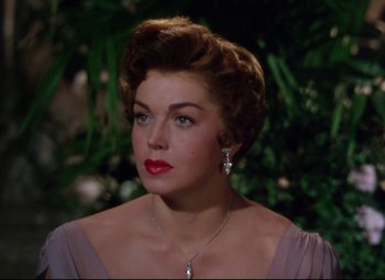 Movie still from “Million Dollar Mermaid” (1952), directed by Mervyn LeRoy – A person wearing a dress; Close Up shot, Over the shoulder angle