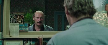 Movie still from “Mindhorn” (2016), directed by Sean Foley – A man looking at himself in the mirror; Close Up shot, Over the shoulder angle