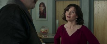 Movie still from “Mindhorn” (2016), directed by Sean Foley – A man and a woman are talking in a room; Medium shot, Over the shoulder angle