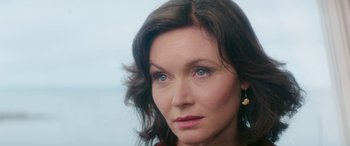 Movie still from “Mindhorn” (2016), directed by Sean Foley – A person wearing a red shirt; Close Up shot, Over the shoulder angle