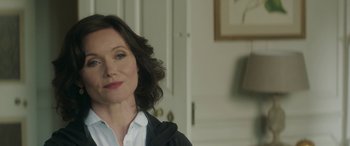 Movie still from “Mindhorn” (2016), directed by Sean Foley – A person wearing a white shirt; Close Up shot, Over the shoulder angle