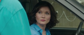 Movie still from “Mindhorn” (2016), directed by Sean Foley – A person sitting in a car; Close Up shot, Over the shoulder angle