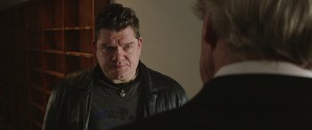 Movie still from “Mindhorn” (2016), directed by Sean Foley – A man looking at himself in the mirror; Close Up shot, Over the shoulder angle