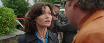 Movie still from “Mindhorn” (2016), directed by Sean Foley – A person talking to another person; Close Up shot, Over the shoulder angle