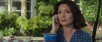 Movie still from “Mindhorn” (2016), directed by Sean Foley – A person talking on a cell phone; Close Up shot, Low angle