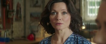 Movie still from “Mindhorn” (2016), directed by Sean Foley – A person wearing a blue shirt; Close Up shot, Over the shoulder angle