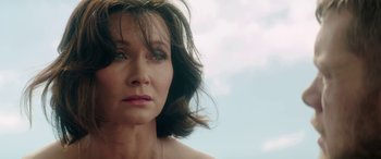 Movie still from “Mindhorn” (2016), directed by Sean Foley – A person wearing a necklace; Close Up shot, Low angle