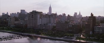 Movie still from “Miss Congeniality 2: Armed & Fabulous” (2005), directed by John Pasquin – A view of a city skyline from across the river; Extreme Wide shot, High angle