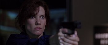 Movie still from “Miss Congeniality 2: Armed & Fabulous” (2005), directed by John Pasquin – A person taking a picture with a cell phone; Close Up shot, Low angle