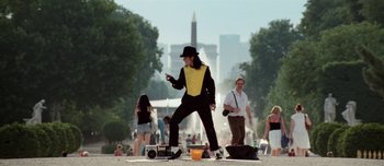 Movie still from “Mister Lonely” (2007), directed by Harmony Korine – A man that is standing on the ground; Wide shot, Low angle