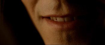 Movie still from “Mister Lonely” (2007), directed by Harmony Korine – View of a woman's lips and teeth; Extreme Close Up shot, Overhead angle