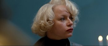 Movie still from “Mister Lonely” (2007), directed by Harmony Korine – A woman with blonde hair is looking to her left; Close Up shot, Low angle