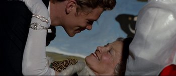 Movie still from “Mister Lonely” (2007), directed by Harmony Korine – A man and a woman looking into each others eyes; Close Up shot, Over the shoulder angle