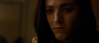 Movie still from “Mister Lonely” (2007), directed by Harmony Korine – A person with long black hair; Close Up shot, Low angle