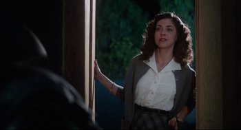 Movie still from “Mommie Dearest” (1981), directed by Frank Perry – A woman standing in front of a window; Medium shot, Over the shoulder angle