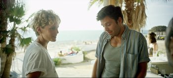 Movie still from “Monday” (2020), directed by Argyris Papadimitropoulos – A man and a woman are talking outside; Medium shot, Over the shoulder angle