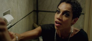 Movie still from “Monday” (2020), directed by Argyris Papadimitropoulos – A person wearing a black shirt; Close Up shot, High angle