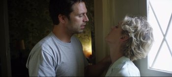 Movie still from “Monday” (2020), directed by Argyris Papadimitropoulos – A man and a woman looking at one another; Close Up shot, Low angle