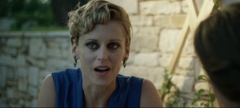 Movie still from “Monday” (2020), directed by Argyris Papadimitropoulos – A person wearing a blue shirt; Close Up shot, Over the shoulder angle