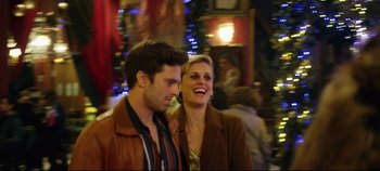 Movie still from “Monday” (2020), directed by Argyris Papadimitropoulos – A man and a woman standing next to each other; Medium shot, Over the shoulder angle