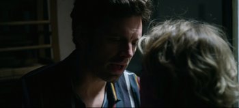 Movie still from “Monday” (2020), directed by Argyris Papadimitropoulos – A person talking to another person; Close Up shot, Over the shoulder angle