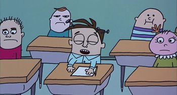 Movie still from “Monkeybone” (2001), directed by Henry Selick – A cartoon of a boy sitting at a desk with his head on a piece of paper; Medium shot, High angle