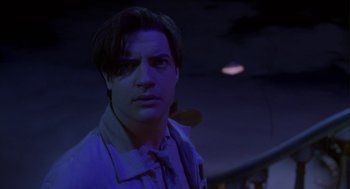 Movie still from “Monkeybone” (2001), directed by Henry Selick – A man in a dark room looking at the camera; Close Up shot, Low angle