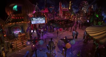 Movie still from “Monkeybone” (2001), directed by Henry Selick – A group of people standing in a room at night; Extreme Wide shot, High angle