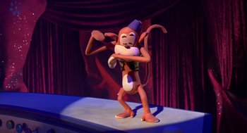 Movie still from “Monkeybone” (2001), directed by Henry Selick – A toy monkey on a stage in a theater; Medium shot, Low angle