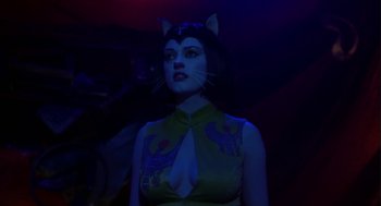 Movie still from “Monkeybone” (2001), directed by Henry Selick – A woman with a cat's head on her head; Close Up shot, Low angle