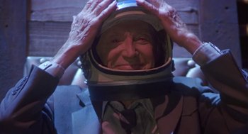 Movie still from “Monkeybone” (2001), directed by Henry Selick – An old man wearing a space suit and a helmet; Close Up shot, Low angle
