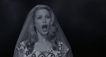 Movie still from “Monkeybone” (2001), directed by Henry Selick – A black and white photo of a woman in a wedding veil; Close Up shot, Low angle