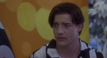 Movie still from “Monkeybone” (2001), directed by Henry Selick – A young man with brown hair wearing a black and white striped shirt; Close Up shot, Low angle