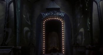 Movie still from “Monkeybone” (2001), directed by Henry Selick – A tunnel that has lights on it; Wide shot, Low angle