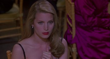 Movie still from “Monkeybone” (2001), directed by Henry Selick – A woman with long blonde hair and red lipstick; Close Up shot, Over the shoulder angle