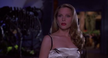 Movie still from “Monkeybone” (2001), directed by Henry Selick – A woman with long blonde hair wearing a white dress; Close Up shot, Low angle