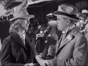 Movie still from “Monsieur Verdoux” (1947), directed by Charles Chaplin – A man and a woman talking to each other; Medium shot, Low angle