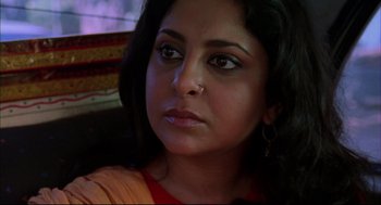 Movie still from “Monsoon Wedding” (2001), directed by Mira Nair – A person with a nose ring; Close Up shot, High angle
