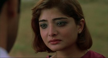 Movie still from “Monsoon Wedding” (2001), directed by Mira Nair – A woman's face with tears in her eyes; Close Up shot, High angle