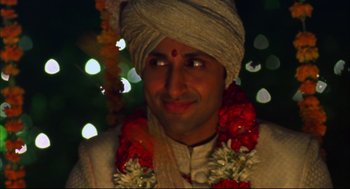 Movie still from “Monsoon Wedding” (2001), directed by Mira Nair – A person wearing a turban; Close Up shot, Low angle
