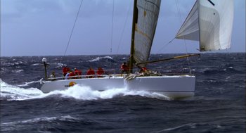 Movie still from “Morning Light” (2008), directed by Mark Monroe – A group of people on a sail boat in the ocean; Extreme Wide shot, High angle