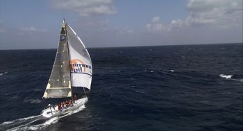 Movie still from “Morning Light” (2008), directed by Mark Monroe – A sailboat in the water; Extreme Wide shot, High angle