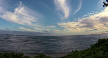 Movie still from “Morning Light” (2008), directed by Mark Monroe – A view of a body of water with a cloudy sky in the background; Extreme Wide shot, High angle