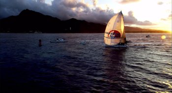 Movie still from “Morning Light” (2008), directed by Mark Monroe – A sailboat in the water at sunset; Extreme Wide shot, Low angle
