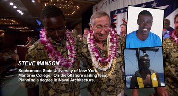 Movie still from “Morning Light” (2008), directed by Mark Monroe – A couple of men standing next to each other on a stage; Close Up shot, Low angle