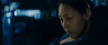 Movie still from “Mother” (2009), directed by Bong Joon Ho – A person sitting in a chair; Close Up shot, Low angle