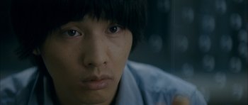 Movie still from “Mother” (2009), directed by Bong Joon Ho – A person's eyes and face; Close Up shot, High angle